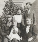 Henry B., holding Glenn, Sarah (Milligan) Bennett, Lura (Monroe) & Vermont Bennett standing, c1913