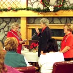 Induction of Charyl Winner by Ohio DAR State Regent Sharlene Shoaf. Lima Regent Nancy Clark looks on.  (Dec 2012_