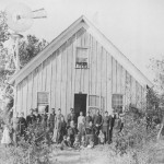 John & Hannah (Huey) Bryan family in front of their Jay County, Indiana, home