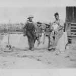 The new Miller horse trough. Howard Caffee, Ruth, Helen, Em, Carl Miller. (c1925)