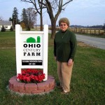 Florence Schumm Miller with Sign