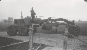 Ted Leininger on road grader 1948.