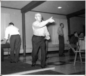 Ted Leininger playing dart ball at Zion Chatt.