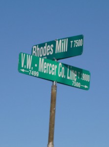 Road sign that still bears the name of Rhodes Mill. (2014 photo by Karen)