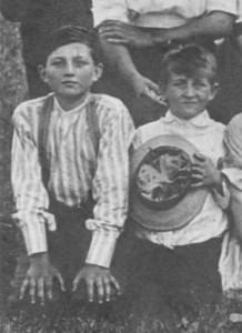 Mainard Brewster, holding hat, first Brewster reunion, 1913.